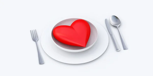 Coração vermelho servido em um prato — Fotografia de Stock