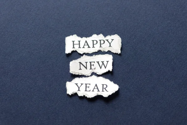 Happy New Year in a piece of paper — Stock Photo, Image