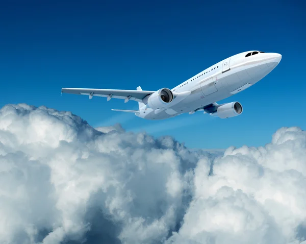 Airplane and clouds — Stock Photo, Image