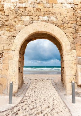Archway leading to beach clipart