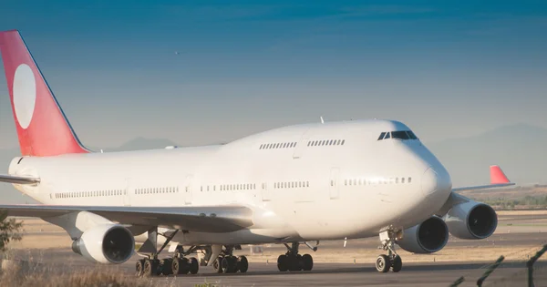 Plane at the airport — Stock Photo, Image