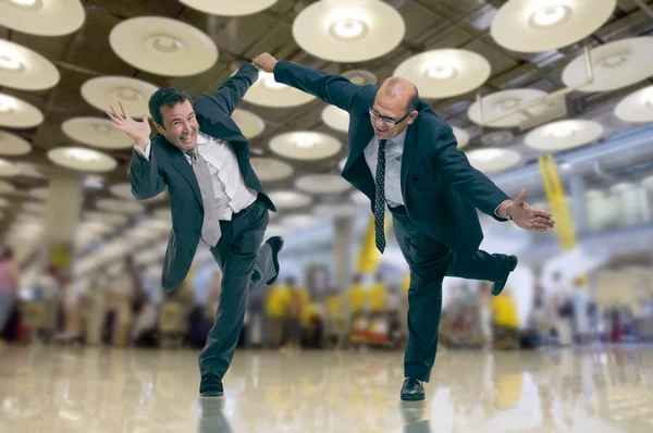 Pressed businessmen at the airport — Stock Photo, Image