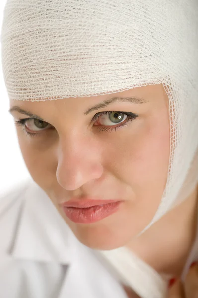 Woman with bandaged head — Stock Photo, Image