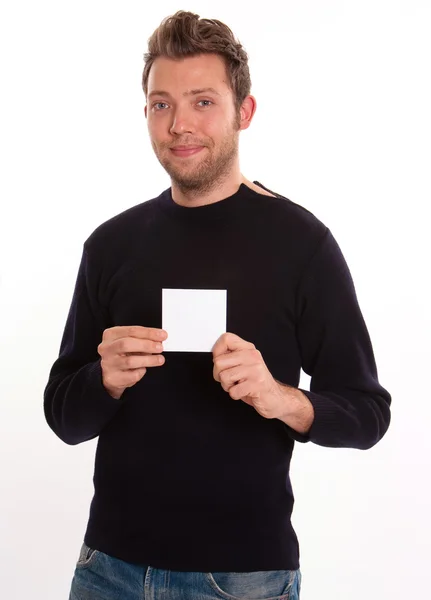 Youngster with blank card — Stock Photo, Image