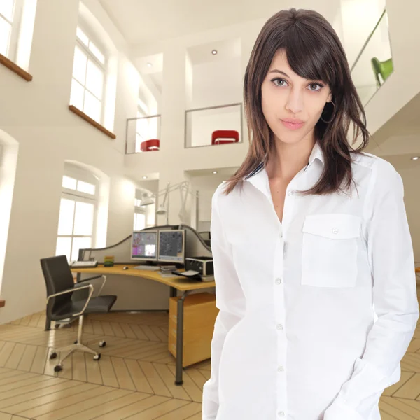 Young woman in office — Stock Photo, Image