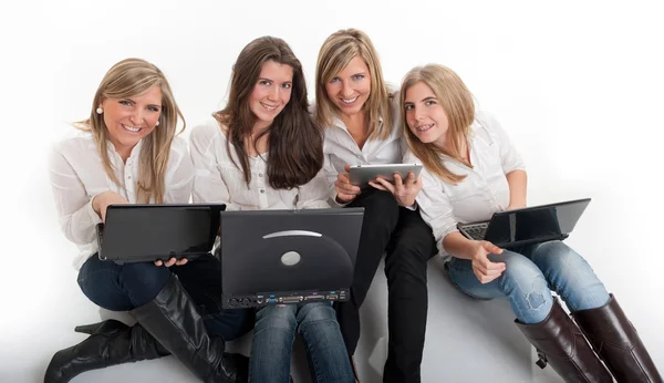 Girls having fun with technology — Stock Photo, Image