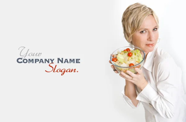 Happy woman holding a salad — Stock Photo, Image