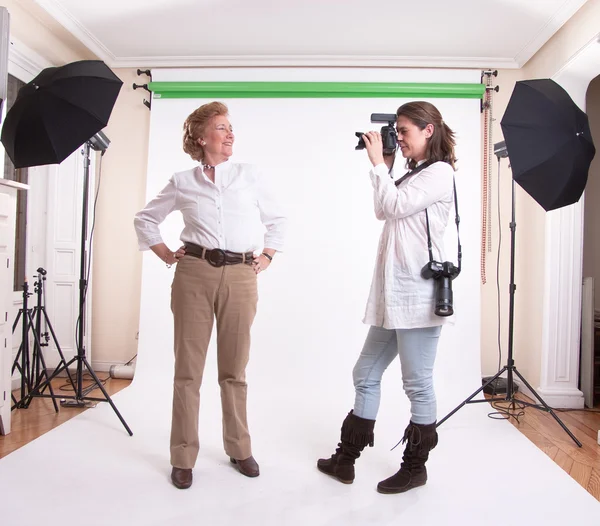 Senior woman in shooting session — Stock Photo, Image