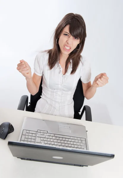 Frustrated woman with laptop — Stock Photo, Image