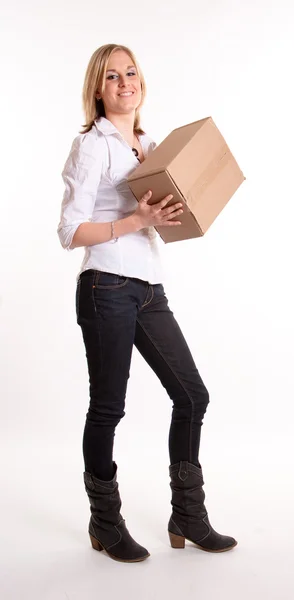 Young woman carrying a box — Stock Photo, Image