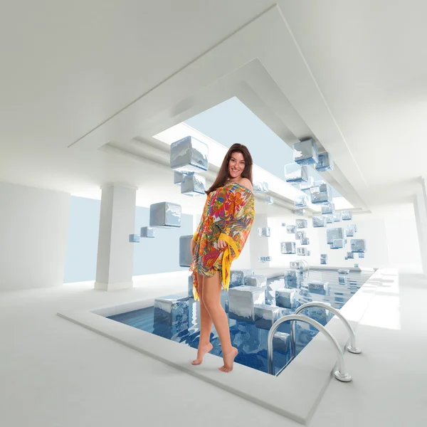 Girl by a sswimming pool with ice cubes — Stock Photo, Image