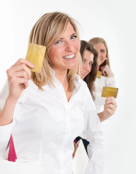 Shopping girls armed with credit cards — Stock Photo, Image