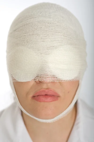 Woman with bandaged face — Stock Photo, Image