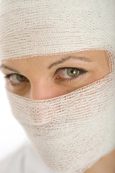 Close-up shot on bandaged face — Stock Photo, Image