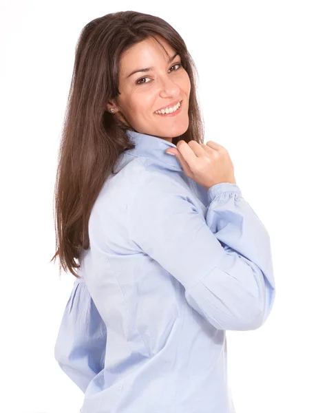 Smiling brunette in a blue shirt — Stock Photo, Image