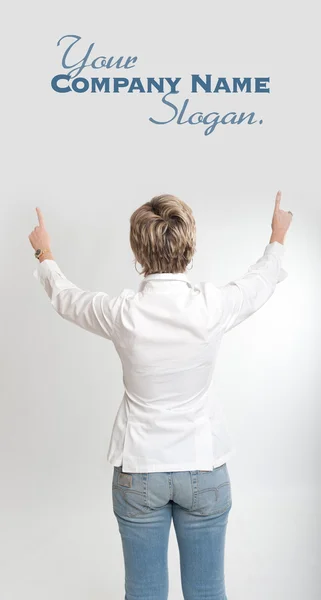 Woman pointing with both hands — Stock Photo, Image