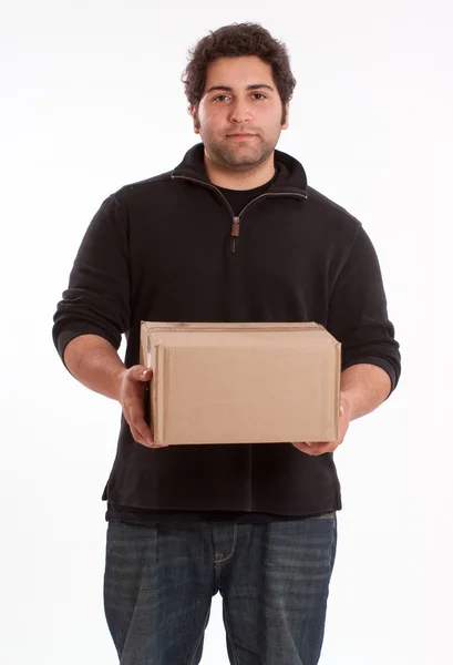 Homem carregando uma caixa — Fotografia de Stock