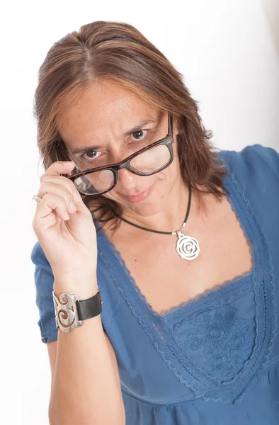 Woman looking above her glasses — Stock Photo, Image