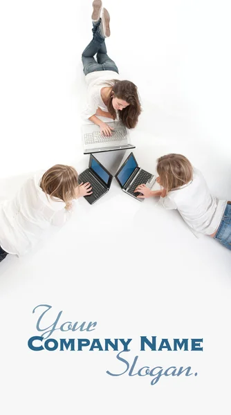 Aerial view of three girls with computer — Stock Photo, Image