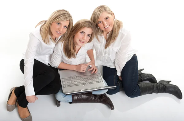 Happy girls with laptop — Stock Photo, Image