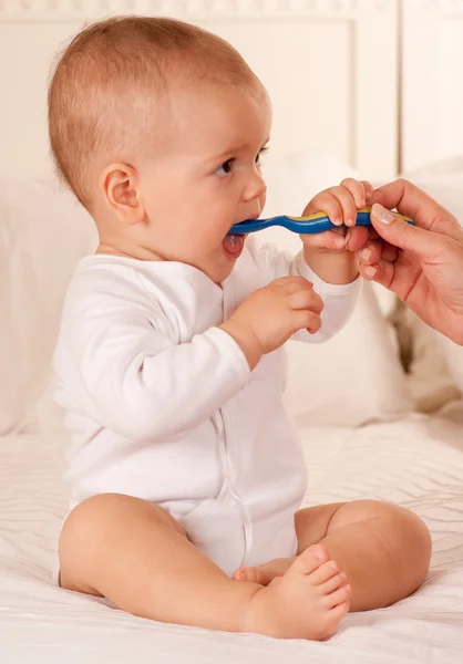 Eating baby Stock Image