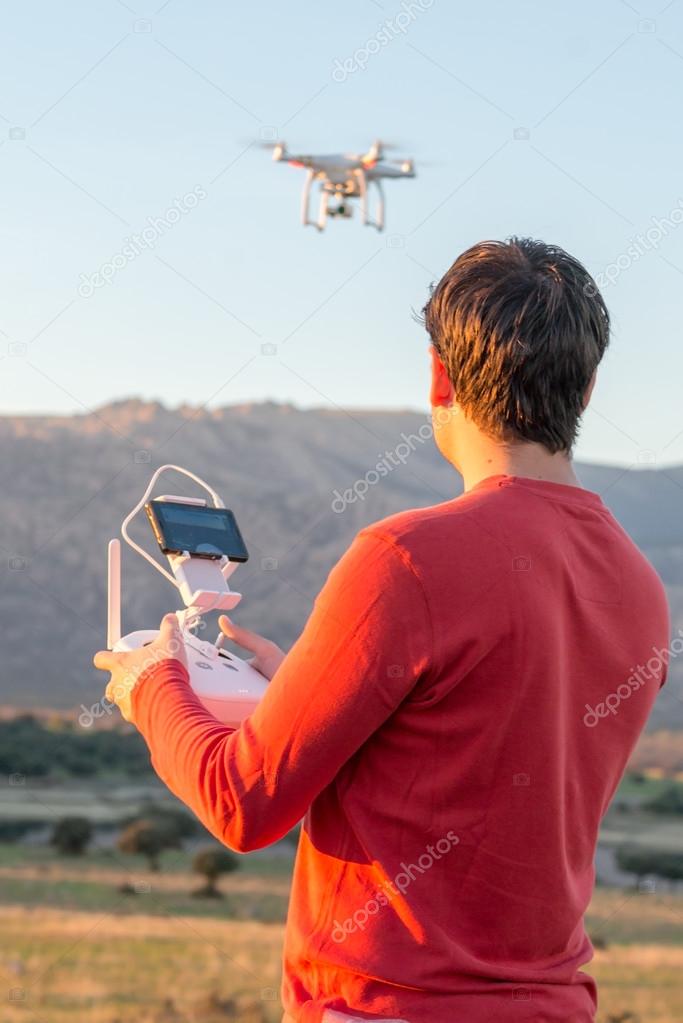 Man guiding a drone