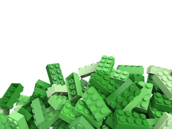 Representación 3D de ladrillos de construcción de juguetes en tonos verdes con un montón de — Foto de Stock