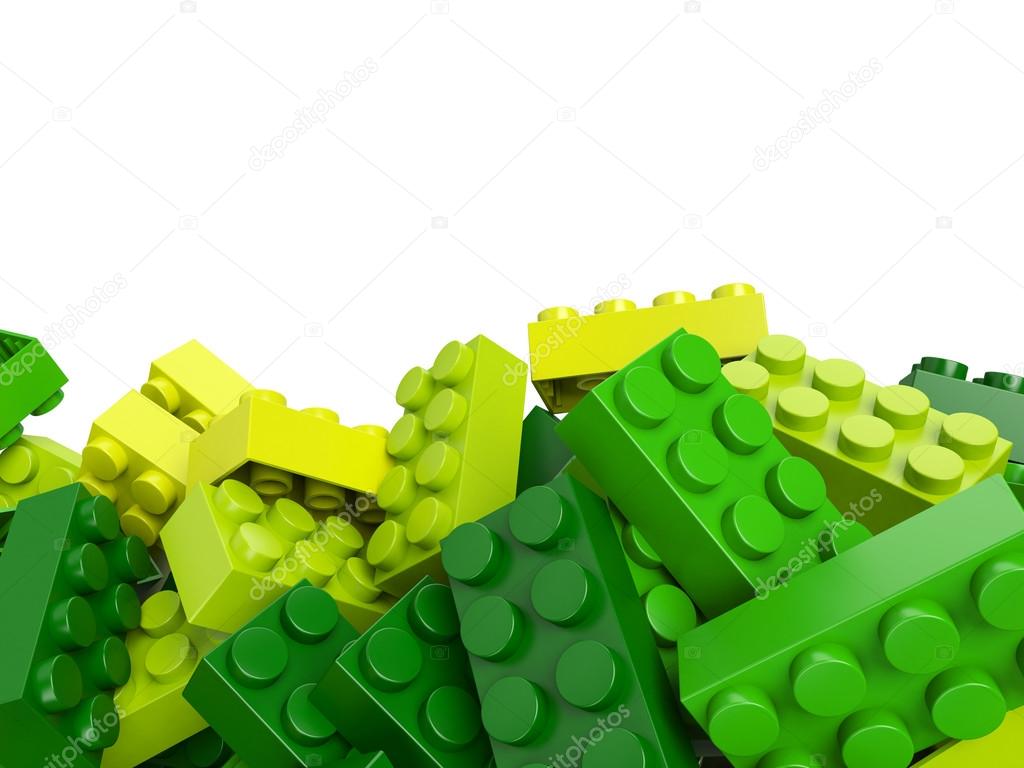 Toy plastic green and yellow bricks