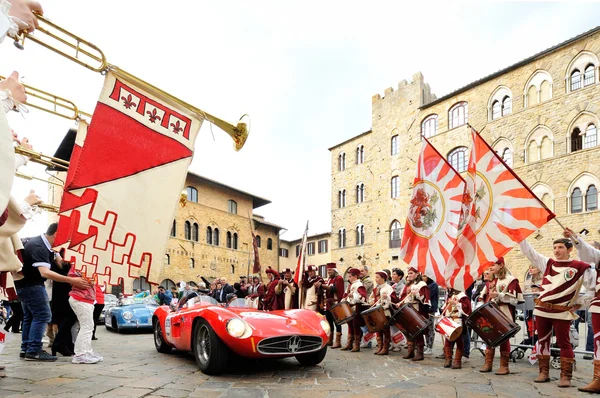 A red Maserati 300 S spider Fantuzzi, followed by a blue Porsche 356 Speedster, takes part to the 1000 Miglia classic car race — Stock Photo, Image