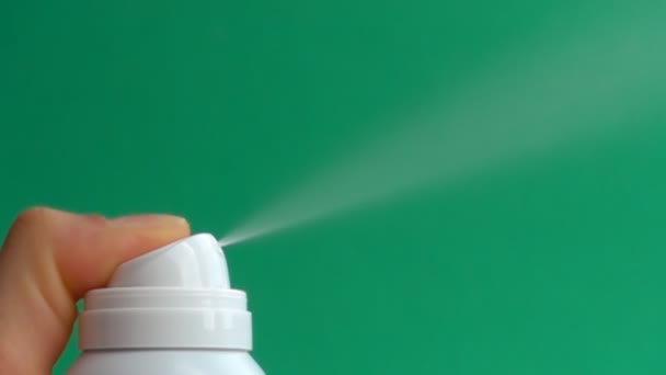 Spraying aerosol deodorant in slow motion — Stock Video