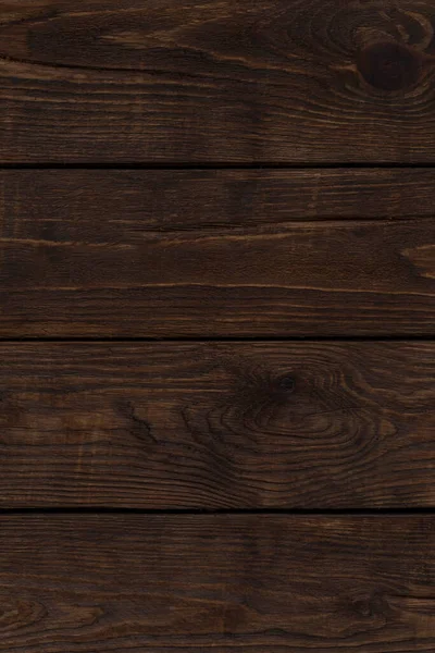 木板制成的深褐色木墙的细部 — 图库照片