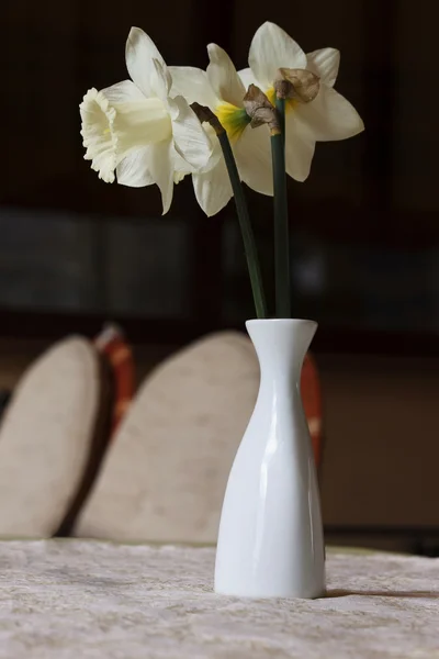Vase with flowers on table — Stock Photo, Image