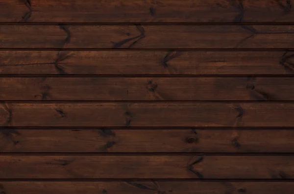Темно-коричнева дерев'яна стіна — стокове фото