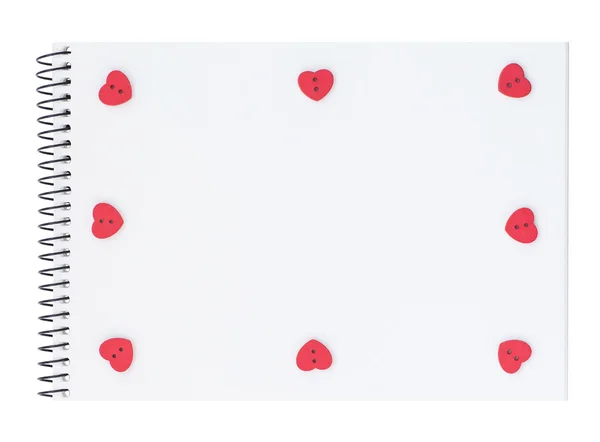 Poznámkový blok s červeným srdcem formoval tlačítka — Stock fotografie