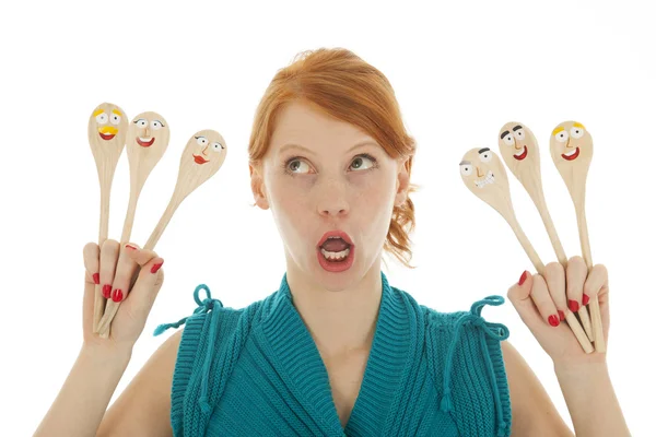 Mujer divertida con cucharas —  Fotos de Stock