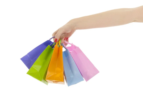 Hand met shopping tassen — Stockfoto