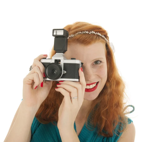 Portrait girl with photo camera and red hair — Stock Photo, Image