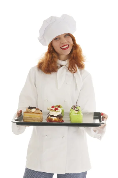 Vrouwelijke baker chef-kok met kerst gebak — Stockfoto