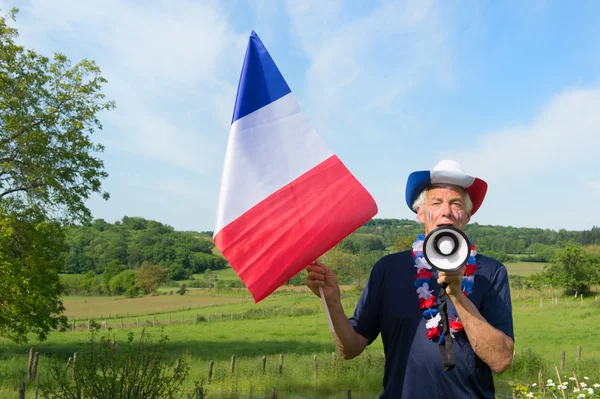 Francouzský fotbalový fanoušek s příznakem — Stock fotografie