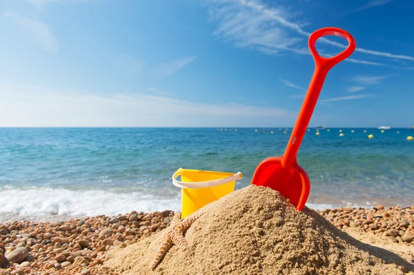 Spielzeug am Strand — Stockfoto