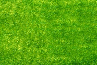 Yapay yeşil çimenlerin arkaplanı