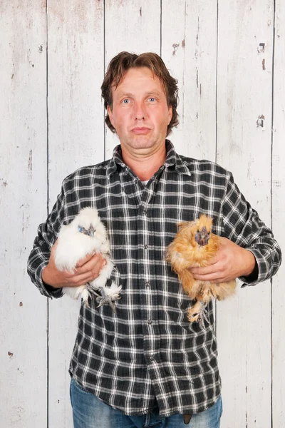 Farmer with chickens — Stock Photo, Image