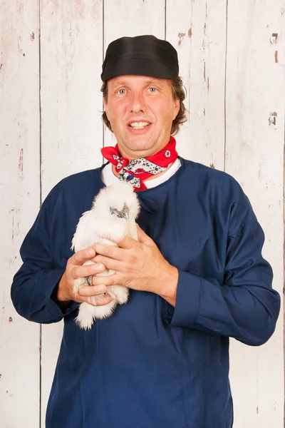 Farmer with chickens — Stock Photo, Image