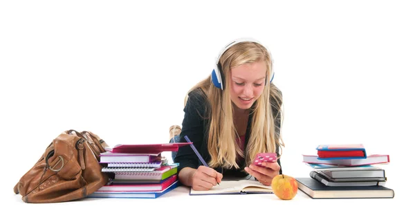 Chica adolescente con tarea y teléfono inteligente — Foto de Stock