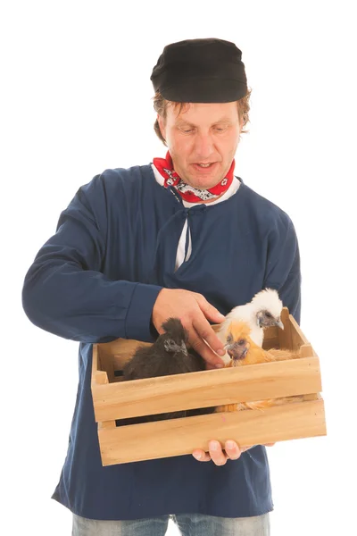 Farmer with chickens — Stock Photo, Image