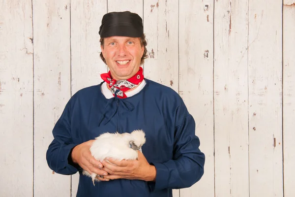 Agricultor con pollo — Foto de Stock