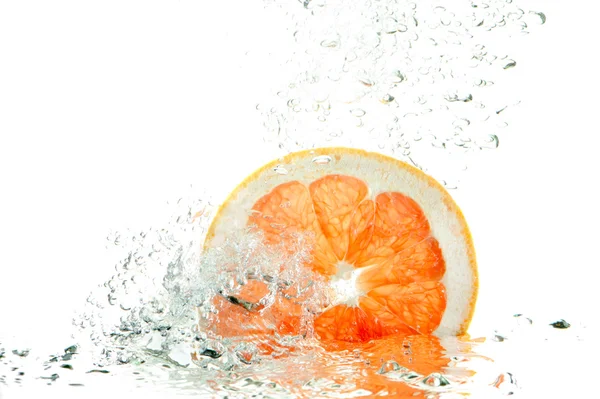 Färsk grapefrukt splash — Stockfoto