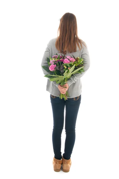 Tonåring med blommor — Stockfoto