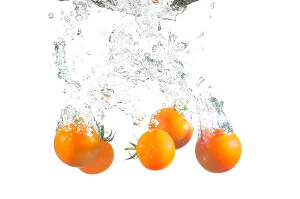 Splashing tomatoes — Stock Photo, Image