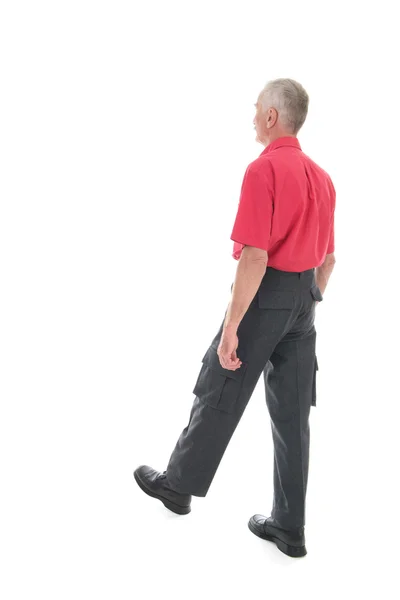 Retired man walking away — Stock Photo, Image